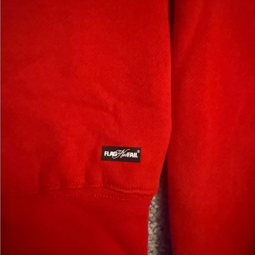 Flag Nor Fail Hustle red hoodie with white lettering. - Picture 6 of 6